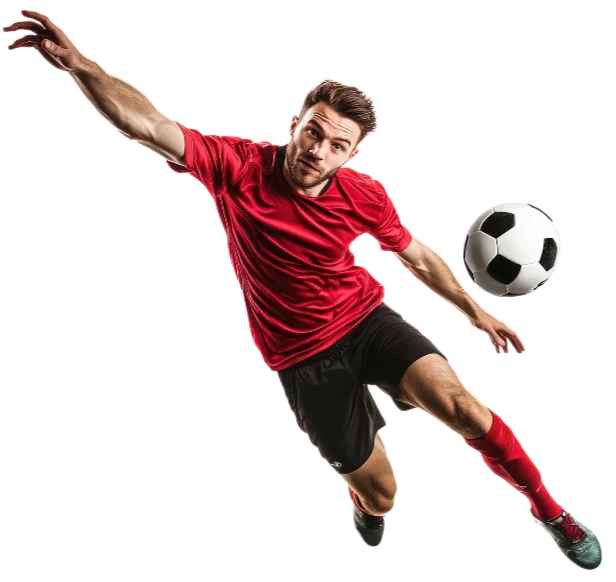 Un footballeur en maillot rouge, en plein saut, effectuant un tir spectaculaire vers un ballon noir et blanc sur fond blanc. Un moment dynamique et intense